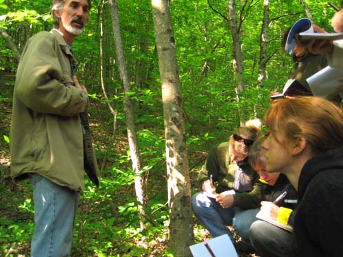 Herbalist Marty Wall teaching in the field